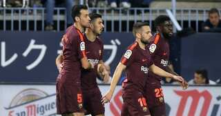 Suarez, Coutinho inspire Barca to win against Malaga