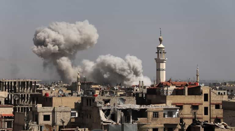 Syria army bombs splintered Ghouta enclave as bodies pile up