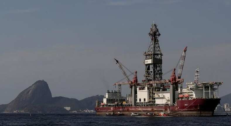 US crude prices fall over rising production, Tillerson firing
