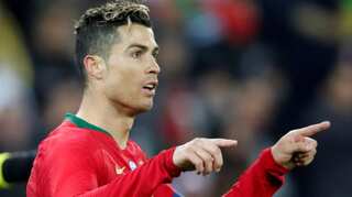 Ronaldo's last-gasp two-goal show steals Salah limelight