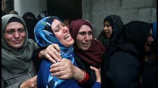 Israeli troops wound 13 on Gaza border, day after deadly protest
