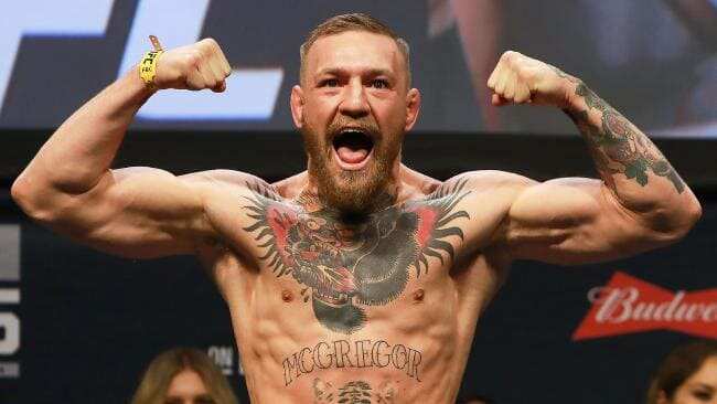 Mixed Martial Arts: McGregor surrenders to New York police after media day chaos