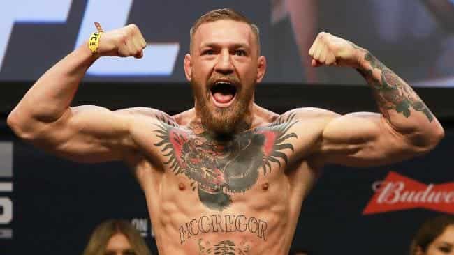 Mixed Martial Arts: McGregor surrenders to New York police after media day chaos