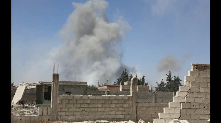Dozens killed in deadly gas attack reported on Syrian rebel enclave, Damascus denies