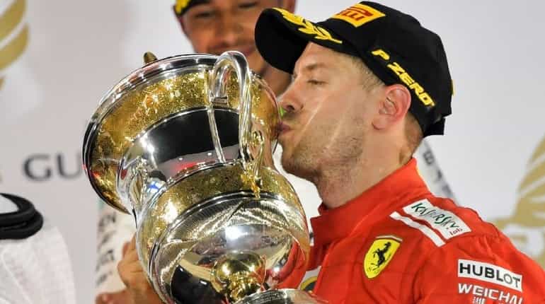 Sebastian Vettel marks 200th race with thrilling Bahrain win Sebastian Vettel marks 200th race with thrilling Bahrain win