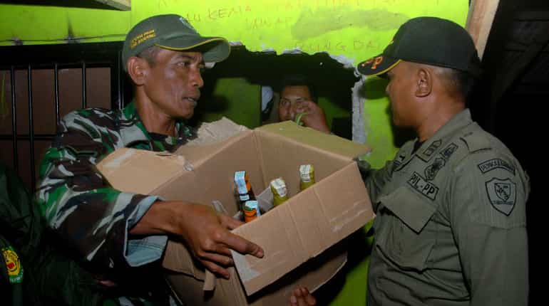 Over 60 dead in Indonesia from drinking bootleg alcohol Over 60 dead in Indonesia from drinking bootleg alcohol