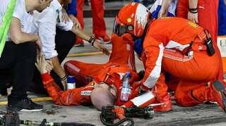 Video: Ferrari's Kimi Raikkonen runs over own pit stop crew member