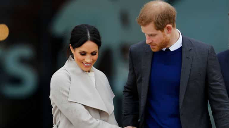Cheering crowds greet Harry on walkabout ahead of UK wedding extravaganza