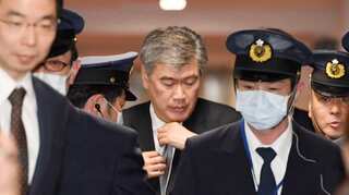 Japan's top finance bureaucrat denies he sexually harassed reporters