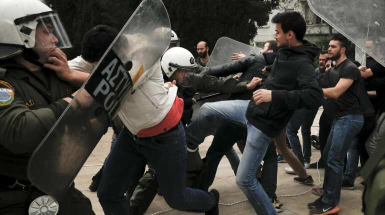 Greek communists vandalised Truman statue to protest against Syria air strike Greek communists vandalised Truman statue to protest against Syria air strike