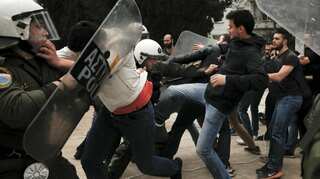 Greek communists vandalised Truman statue to protest against Syria air strike