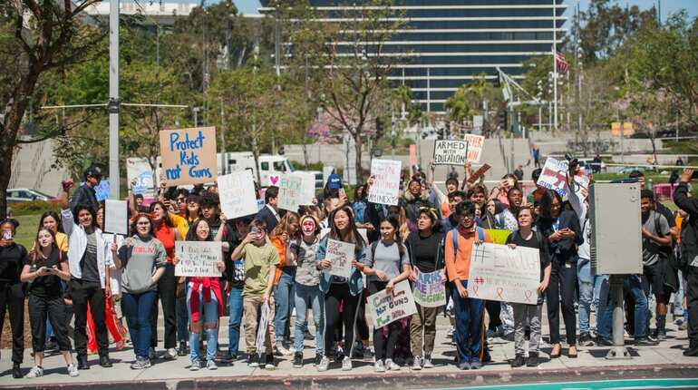 US students walk out again to protest gun violence US students walk out again to protest gun violence