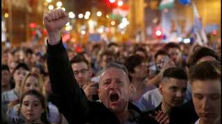 Tens of Thousands of Hungarians stage protest against Prime Minister Viktor Orban