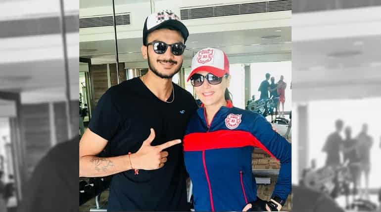 Preity Zinta with Axar Patel during a gym session
