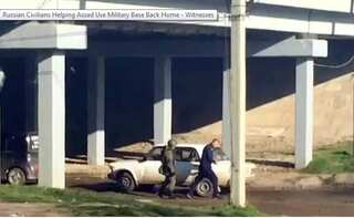 Russian civilians helping Assad use military base back home - Witnesses