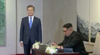 'An age of peace, from the starting point of history,' Kim writes in guestbook