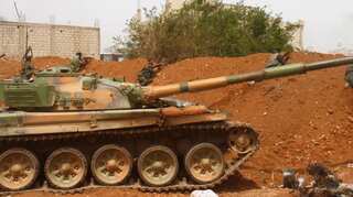 Syrian rebels pull out of their last besieged area