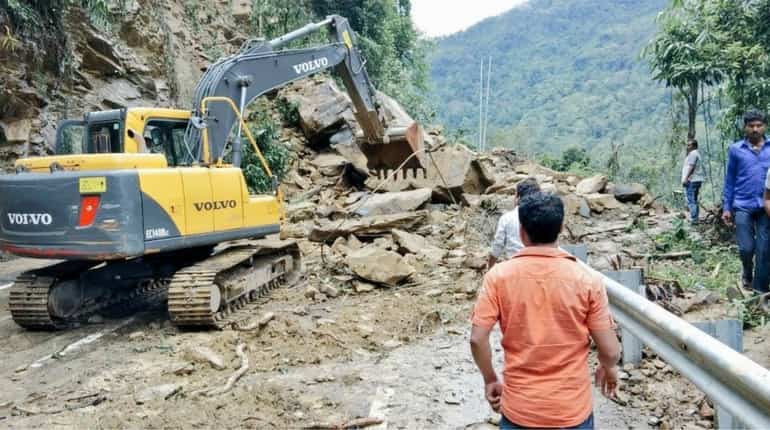 The landslide brought in massive mound of mud and boulders