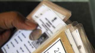 Karnataka elections: EC arrests 2 in connection with recovery of fake voter ID cards