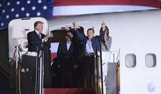 Trump meets 3 American prisoners freed by North Korea at US Air Force base