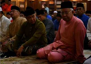 Malaysia's Najib says to take short break, follows reports he may leave for Jakarta
