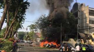 Family of IS-inspired suicide bombers attack Indonesian churches, at least 13 dead