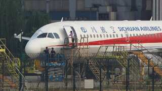 Sichuan Airlines pilot was 'sucked halfway' out of window, says captain