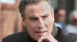John Travolta wins internet after he adopts dog from Betty White's Oscar tribute