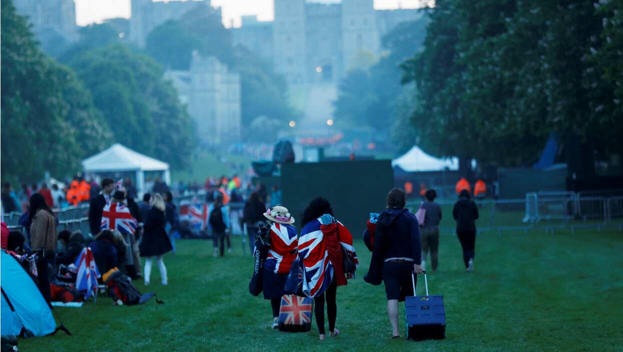 Royal fans arrive ahead of the wedding of Britain's Prince Harry to Meghan Markle
