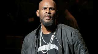 Singer R Kelly charged in sex scheme of kidnapping and payoffs