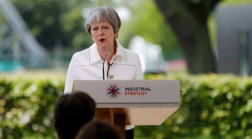 UK PM Theresa May joins families to remember Manchester pop concert victims