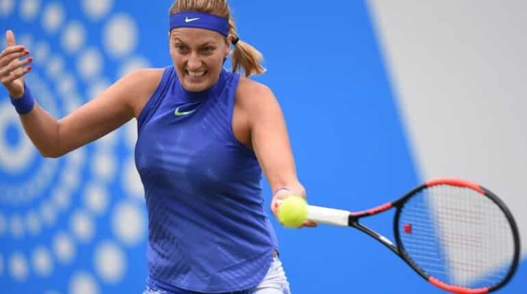 French Open: Petra Kvitova loses set but wins match to reach second round