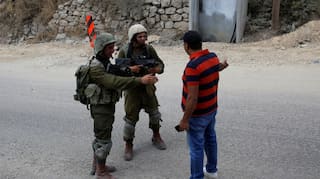 Palestinian tries to hit Israeli soldiers with car, shot dead: Army