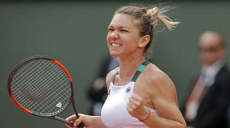 French Open: Halep subdues Petkovic after tight early tussle French Open: Halep subdues Petkovic after tight early tussle