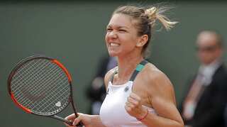 French Open: Halep subdues Petkovic after tight early tussle
