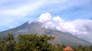 In Guatemala, woman searches for 50 relatives buried by volcano