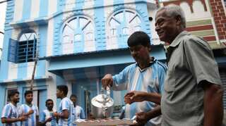 Messi's magic in India: Kolkata tea-seller paints home in Argentina colours