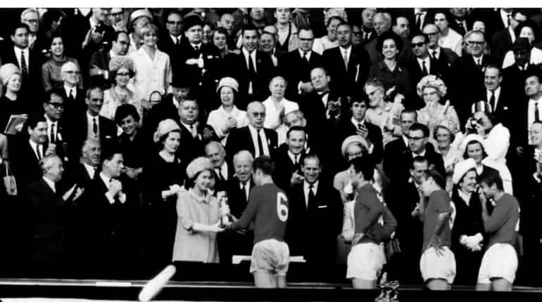 Queen Elizabeth II presents the World Cup