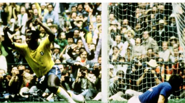 Pele celebrates after scoring the opening goal