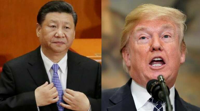 China says it will never surrender to foreign pressure amid trade dispute