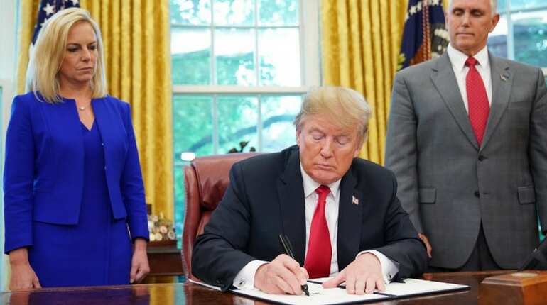 Trump backs down