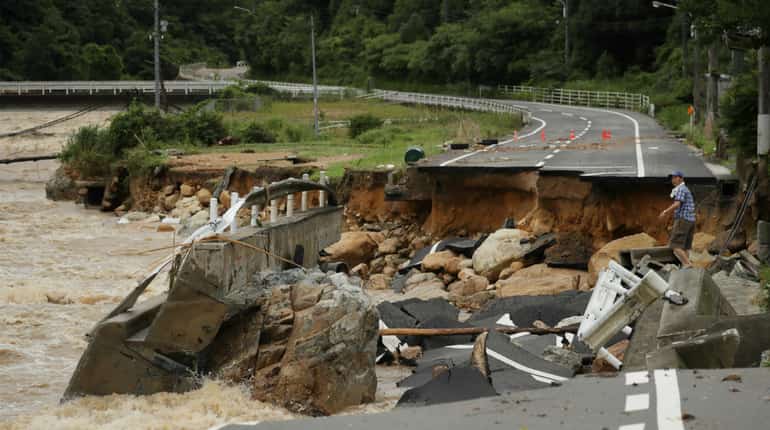 Collapsed road due to heavy rain in Higashihiroshima