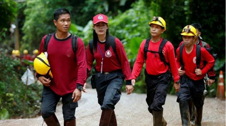 Rescue workers arrive at the Tham Luang cave complex