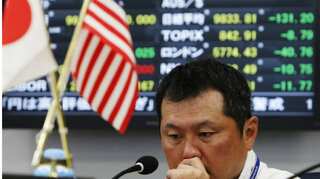 Asian shares hover below 3-week high as Fed rate hike looms