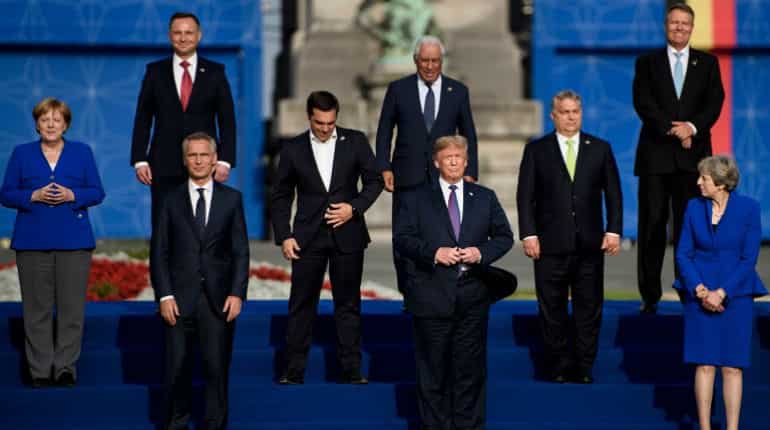 NATO summit: No shove, but Trump's body language signals frosty relations