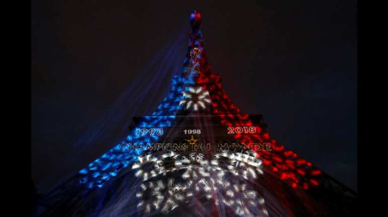 Eiffel Tower lit up in celebration
