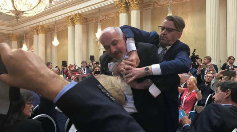 Helsinki summit: Reporter forcibly removed from Trump-Putin conference Helsinki summit: Reporter forcibly removed from Trump-Putin conference
