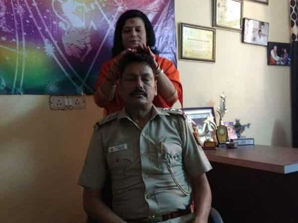 Cop transferred after picture with god woman goes viral Cop transferred after picture with god woman goes viral