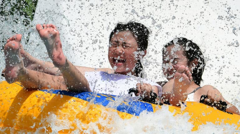 Youth chilling and enjoying water slides