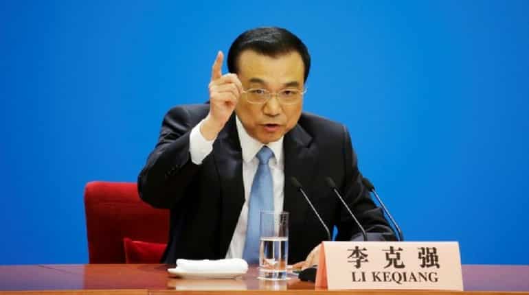 China's premier says tax cuts support employment, economic stability